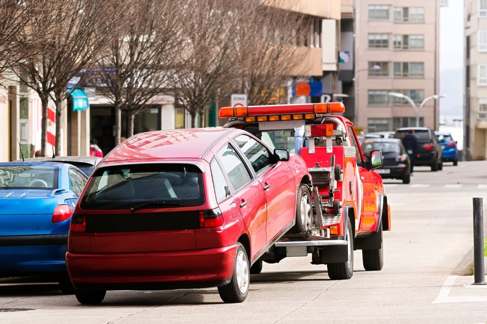 San Bernardino towing company flatbed tow truck ready for collision towing and vehicle recovery services